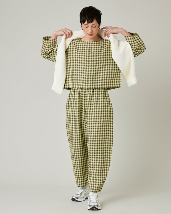 model wears matcha gingham linen mabel trousers