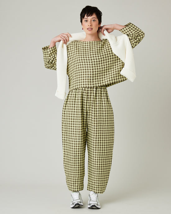 model wears matcha gingham linen mabel trousers