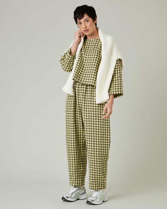 model wears matcha gingham linen mabel trousers