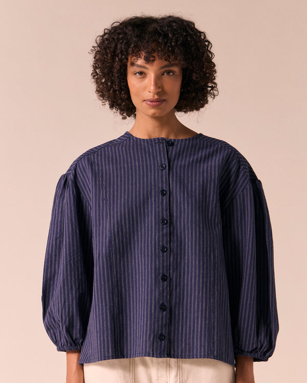 model wears miley midnight pinstripe cotton linen top