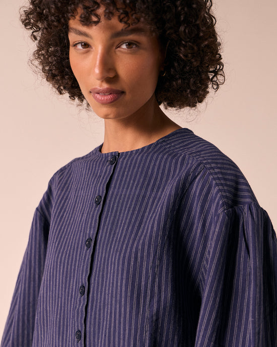 model wears miley midnight pinstripe cotton linen top