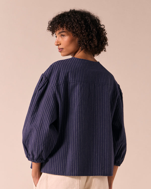 model wears miley midnight pinstripe cotton linen top