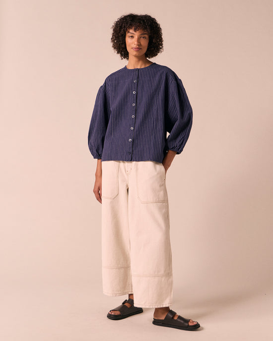 model wears miley midnight pinstripe cotton linen top