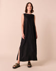 model wears mylia black linen dress