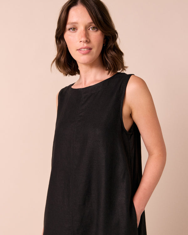 model wears mylia black linen dress