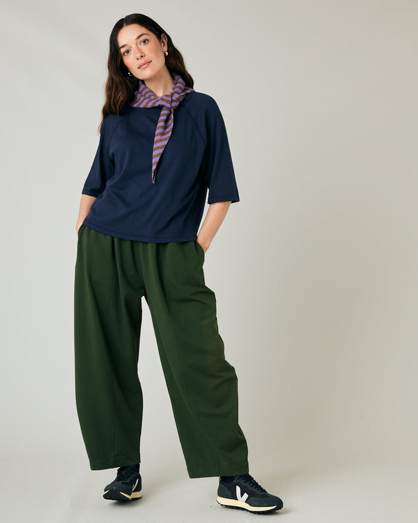 model wears navy jersey raglan top