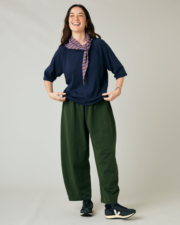 model wears navy jersey raglan top