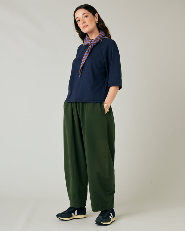 model wears navy jersey raglan top