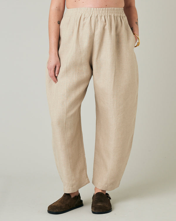 pregnant model wears oat mabel linen trousers front