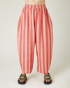 model wears blush stripe mabel trousers from the front