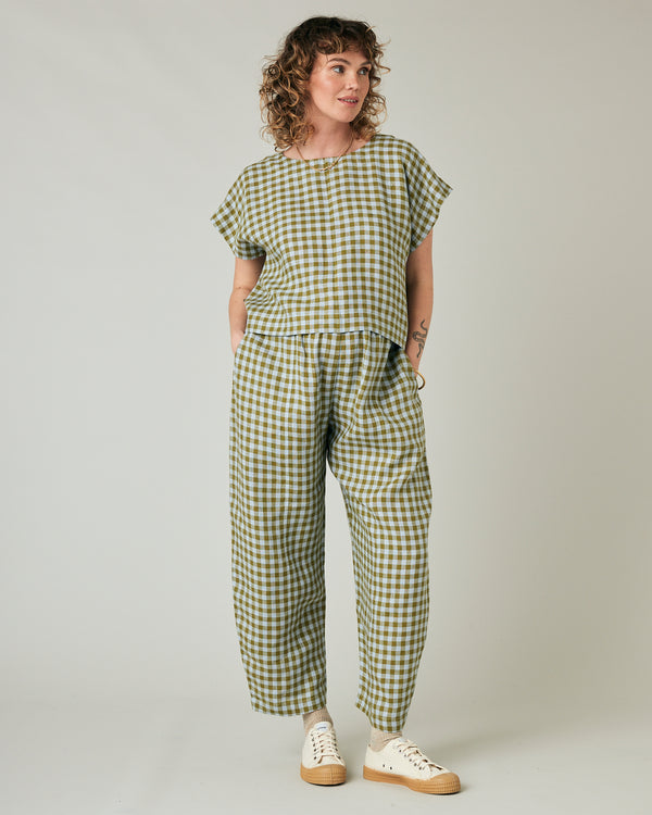 pregnant model wears meadow check linen polly top