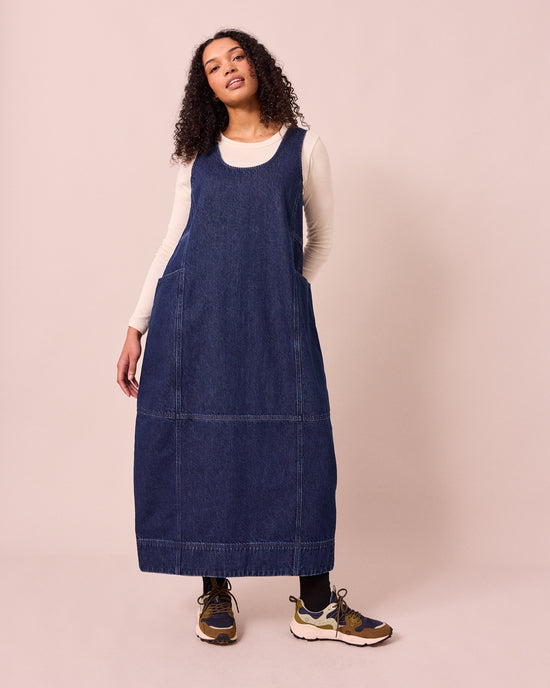 model wears naima dark blue denim dress