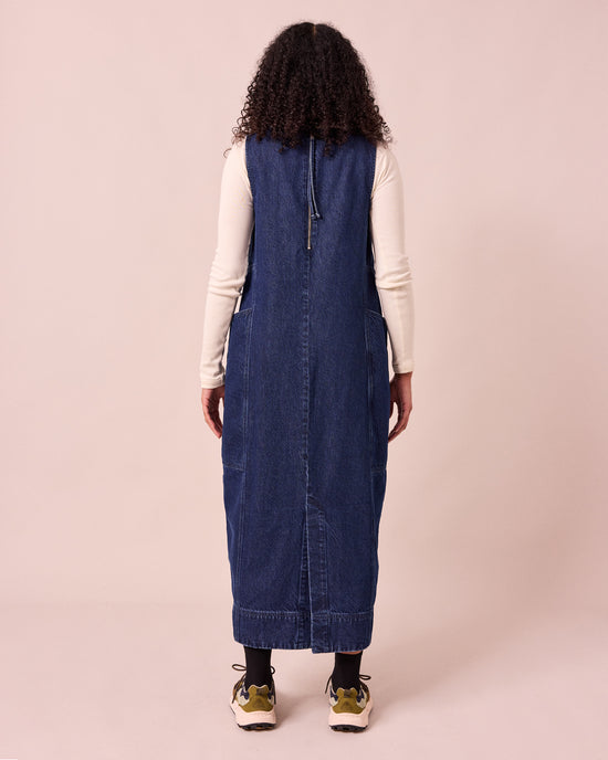 model wears naima dark blue denim dress