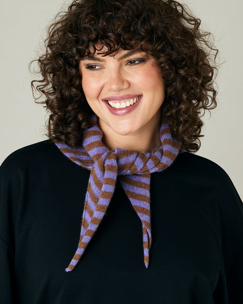 model wears lavender and hazelnut stripe knitted neckerchief