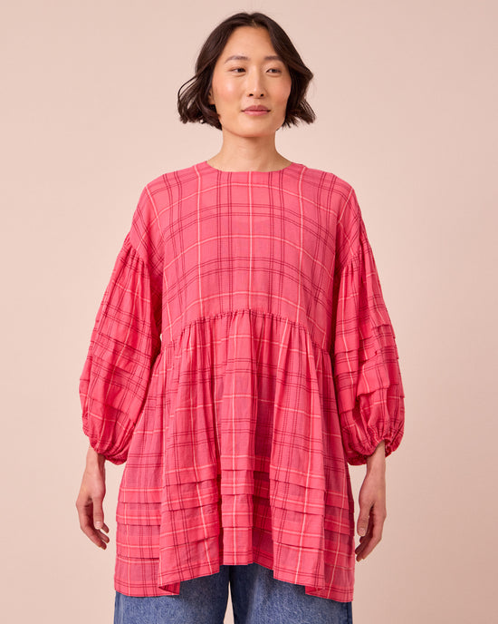 model wears nina hot pink cotton gauze dress