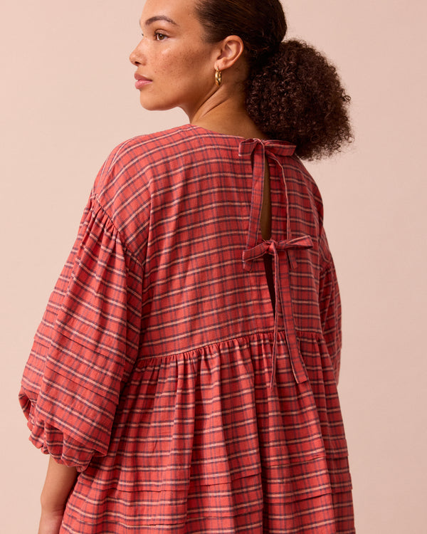 model wears nina washed tartan plaid cotton linen dress