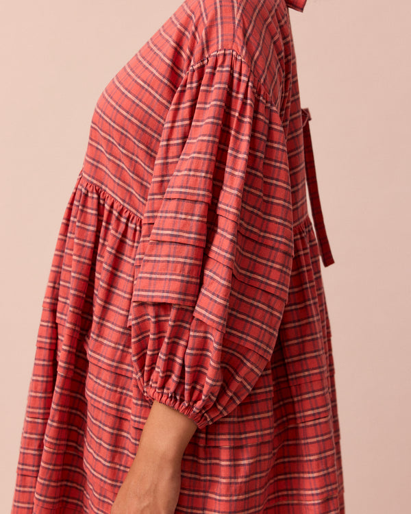 model wears nina washed tartan plaid cotton linen dress