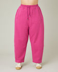 model wears cactus pink madi trousers front