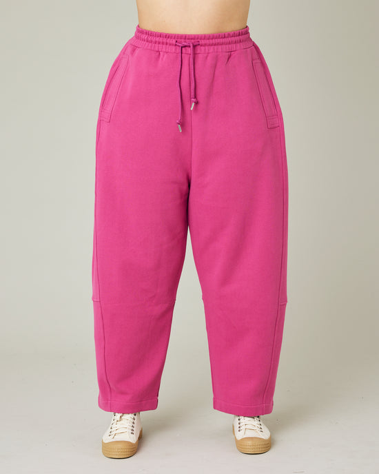 model wears cactus pink madi trousers front