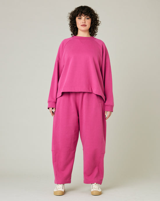 model wears cactus pink noa jumper and madi trousers