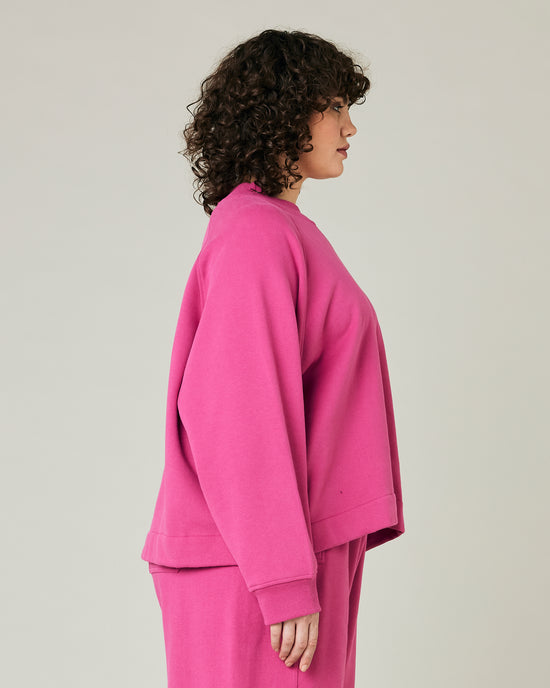 model wears cactus pink noa jumper