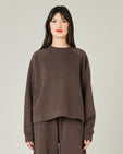 model wears chocolate jersey noa jumper