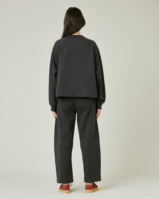 model wears slate jersey madi trousers