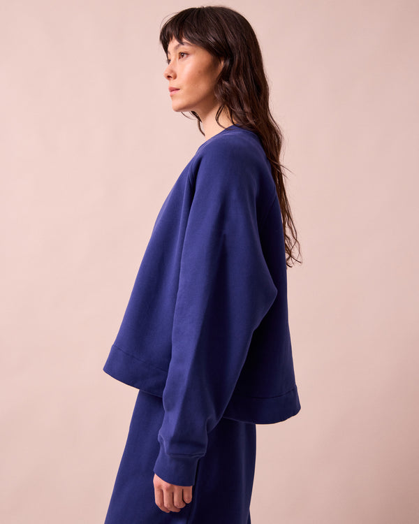 model wears noa french blue fleeceback jersey jumper