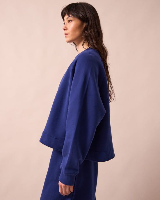 model wears noa french blue fleeceback jersey jumper