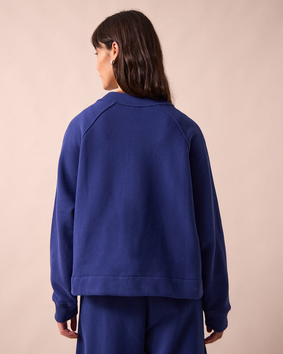 model wears noa french blue fleeceback jersey jumper