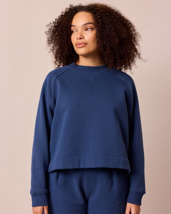 model wears noa french navy fleeceback jersey jumper
