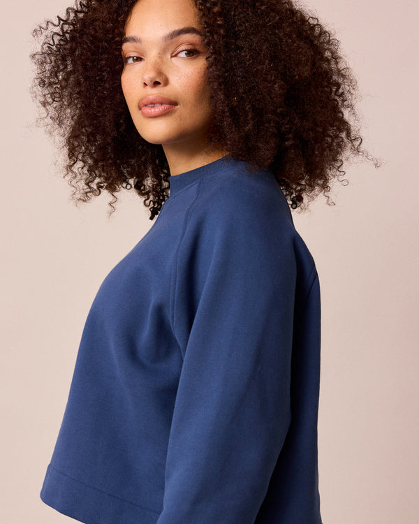 model wears noa french navy fleeceback jersey jumper
