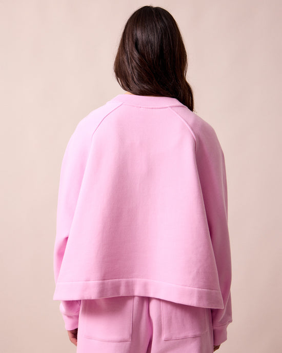 model wears noa orchid pink fleeceback jersey jumper