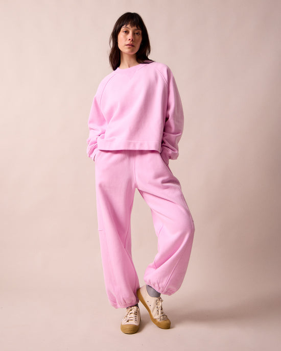 model wears noa orchid pink fleeceback jersey jumper