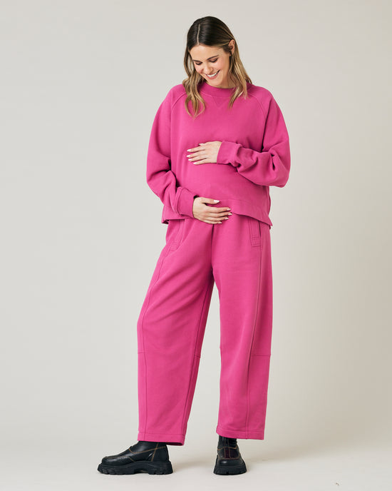 pregnant model wears cactus rose jersey noa jumper and madi trousers