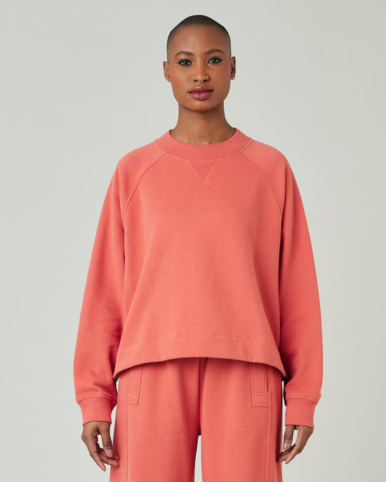 model wears terracotta jersey noa jumper