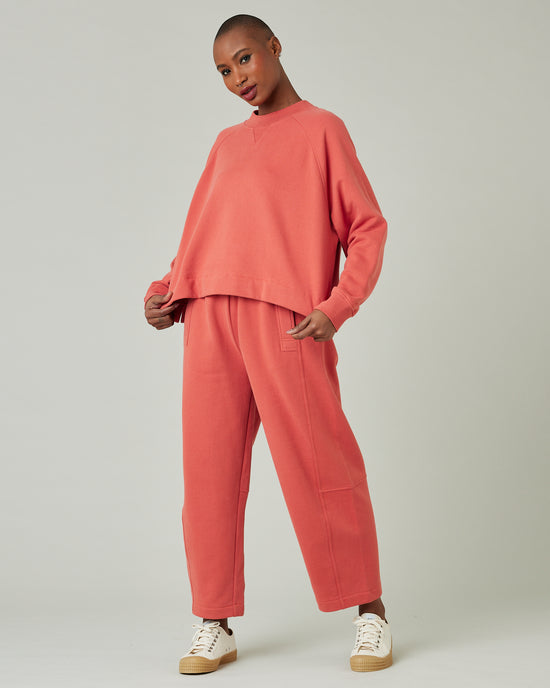 model wears terracotta jersey madi trousers