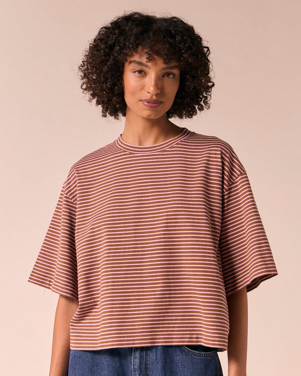 model wears nova toffee and rose pink stripe jersey top