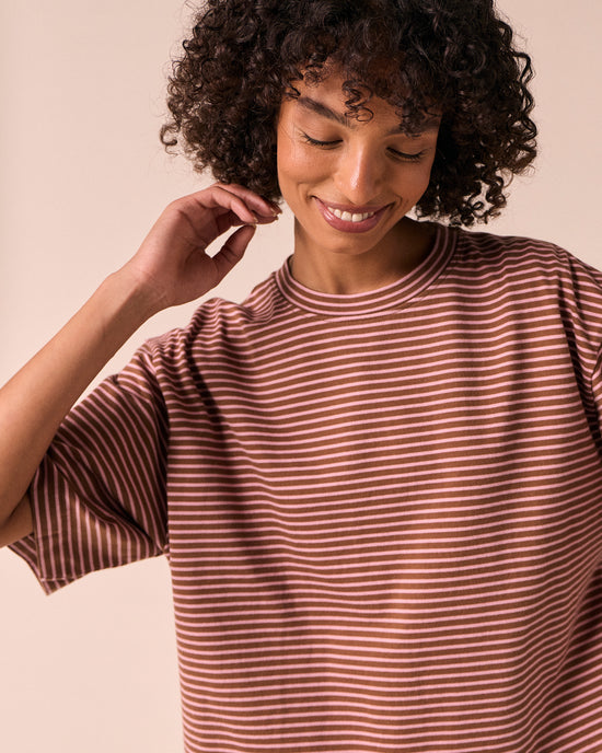 model wears nova toffee and rose pink stripe jersey top