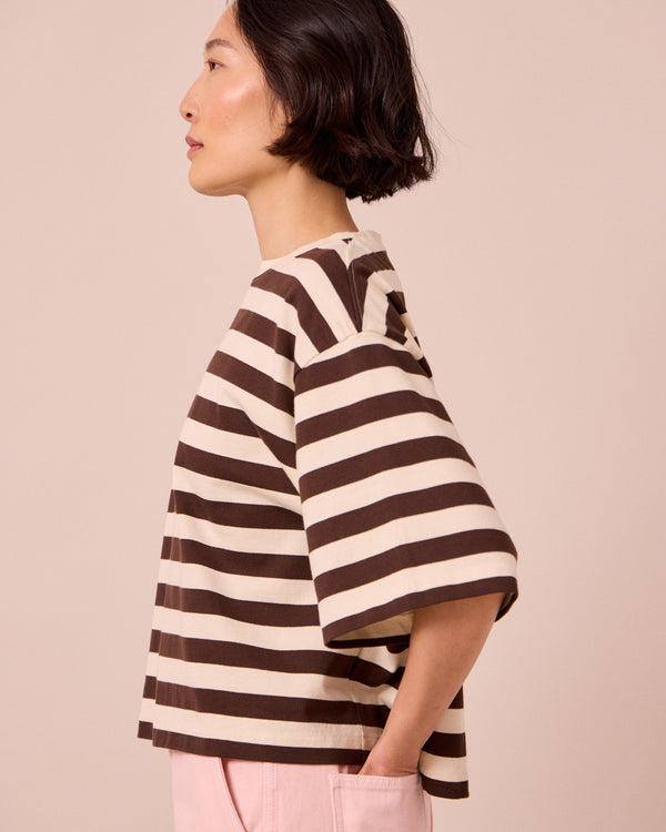 model wears nova bone and ecru jersey top