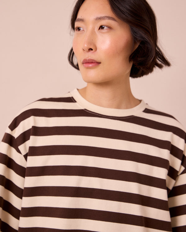model wears nova bone and ecru jersey top
