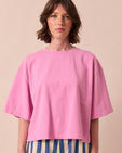 model wears nova washed pink jersey top
