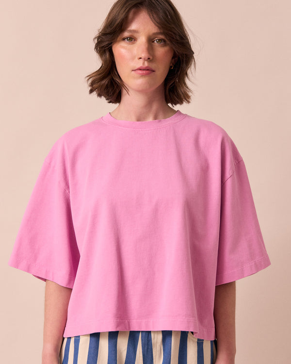 model wears nova washed pink jersey top