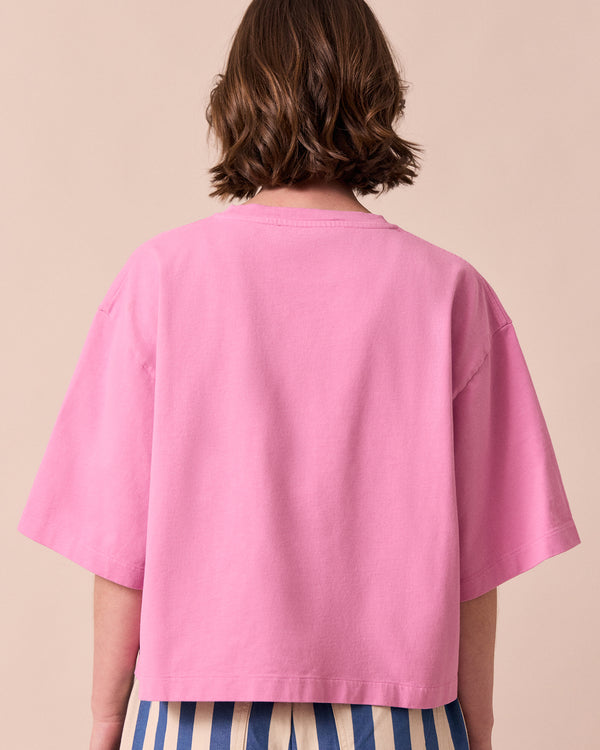 model wears nova washed pink jersey top