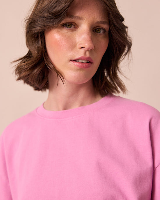 model wears nova washed pink jersey top