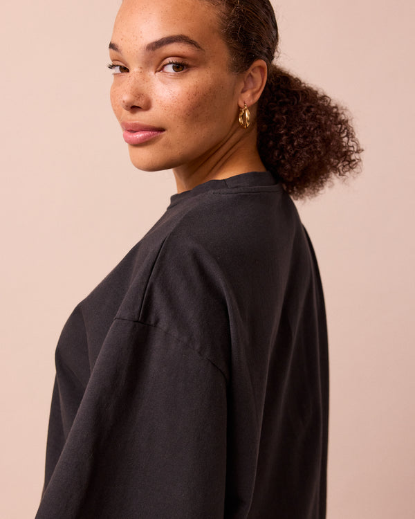 model wears nova black jersey top