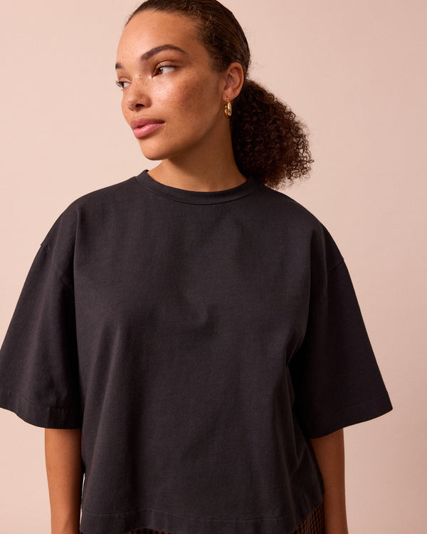 model wears nova black jersey top