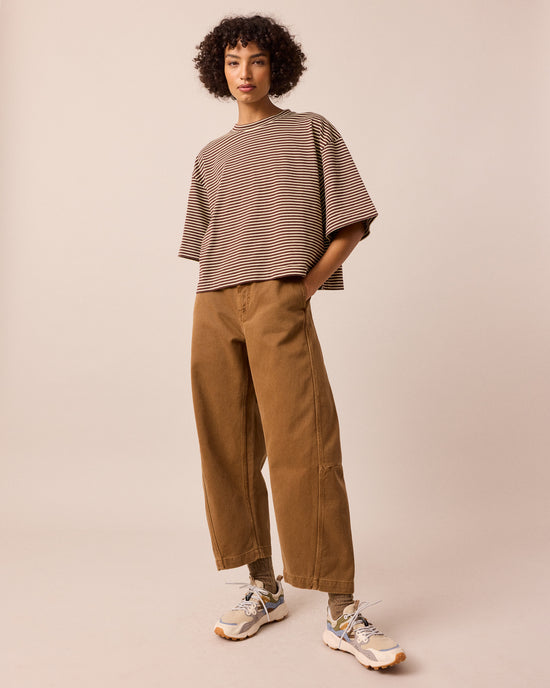 model wears nova brown and butter stripe jersey top