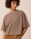 model wears nova brown and butter stripe jersey top