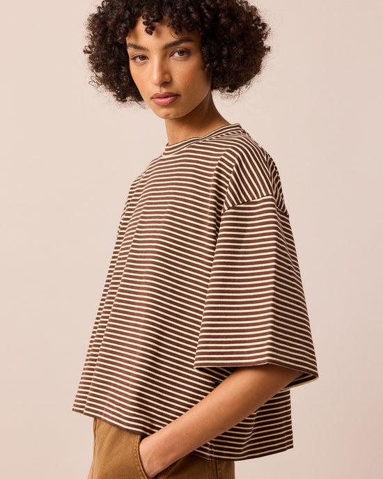 model wears nova brown and butter stripe jersey top